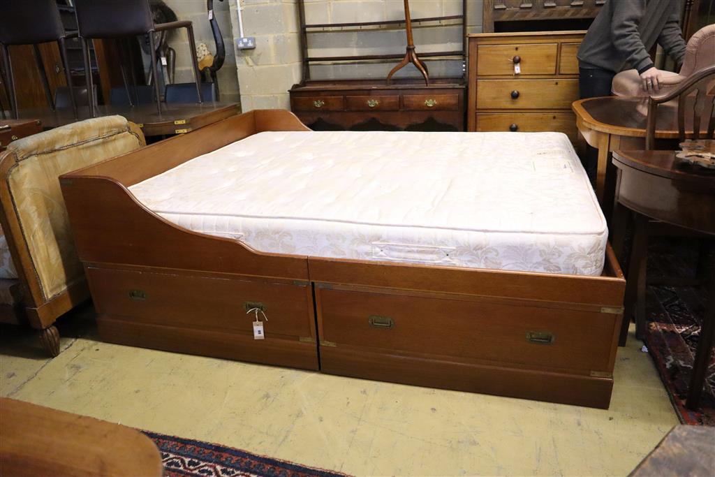 Jans of London. A reproduction mahogany campaign style double bed frame and mattress, folding top and four drawers, width 158cm